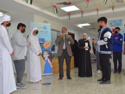 GR-12-Boys giving donation at Sharjah City for HumanitarianServices